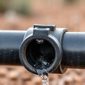 Tucson drip irrigation leak repair expert fixing a pipe