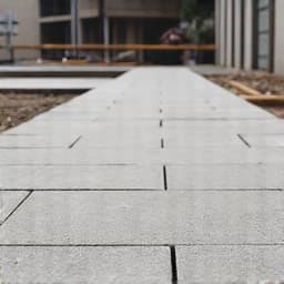 After: Clean ground where heavy construction materials once lay in Casas Adobes. A significantly cleaner and safer job site in Casas Adobes following the removal of heavy concrete and brick debris.