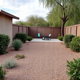 After image of a clean and spacious residential backyard, transformed by professional junk removal services in Oro Valley, AZ