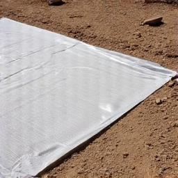 Ground preparation for gravel installation in Casas Adobes.