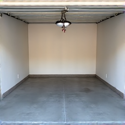 Clean and organized garage after estate cleanout in Oro Valley. This image shows a completely cleared garage, demonstrating the effectiveness of comprehensive estate junk removal services.